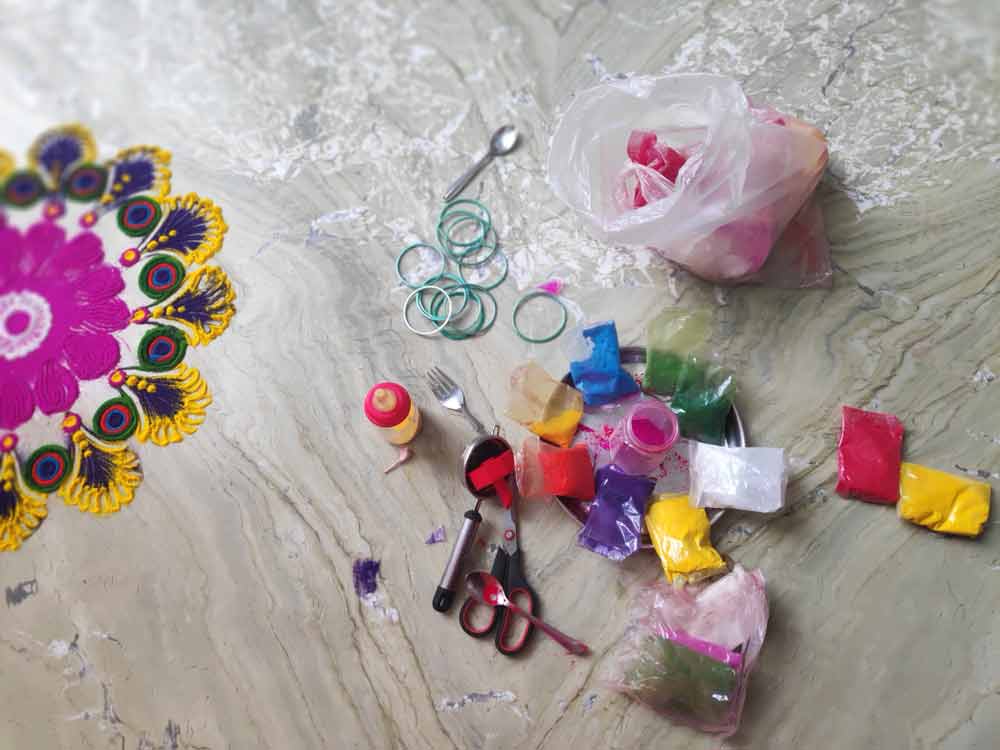 rangoli colour stains from tiles easily