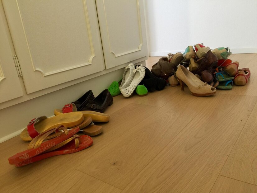 various-shoes-floorboard-home_1048944-21837362