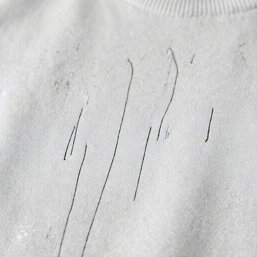 how to clean white sweater