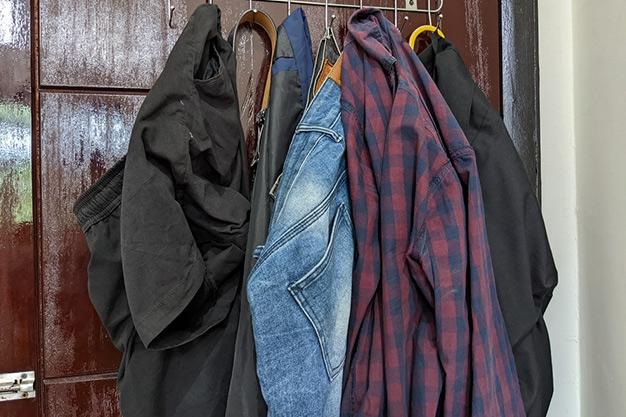 can we hang clothes behind door