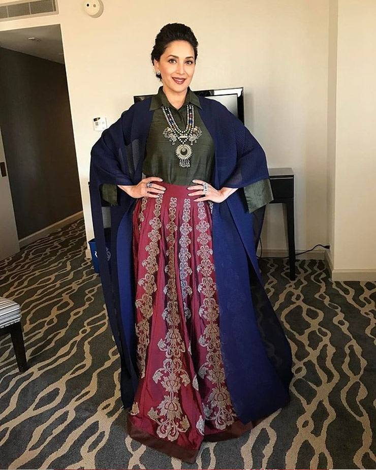 Traditional outfits with capes