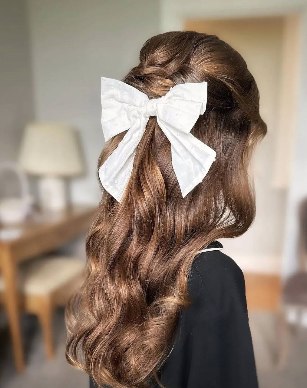 Half curl bow hairstyle