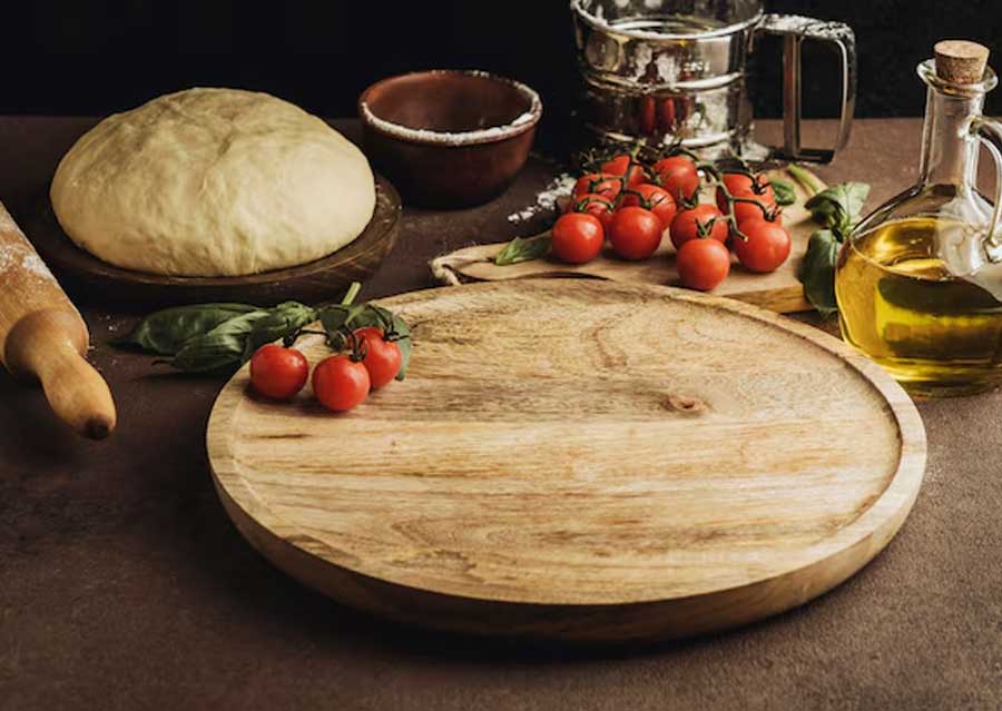 What do you put on the bottom of a pizza stone