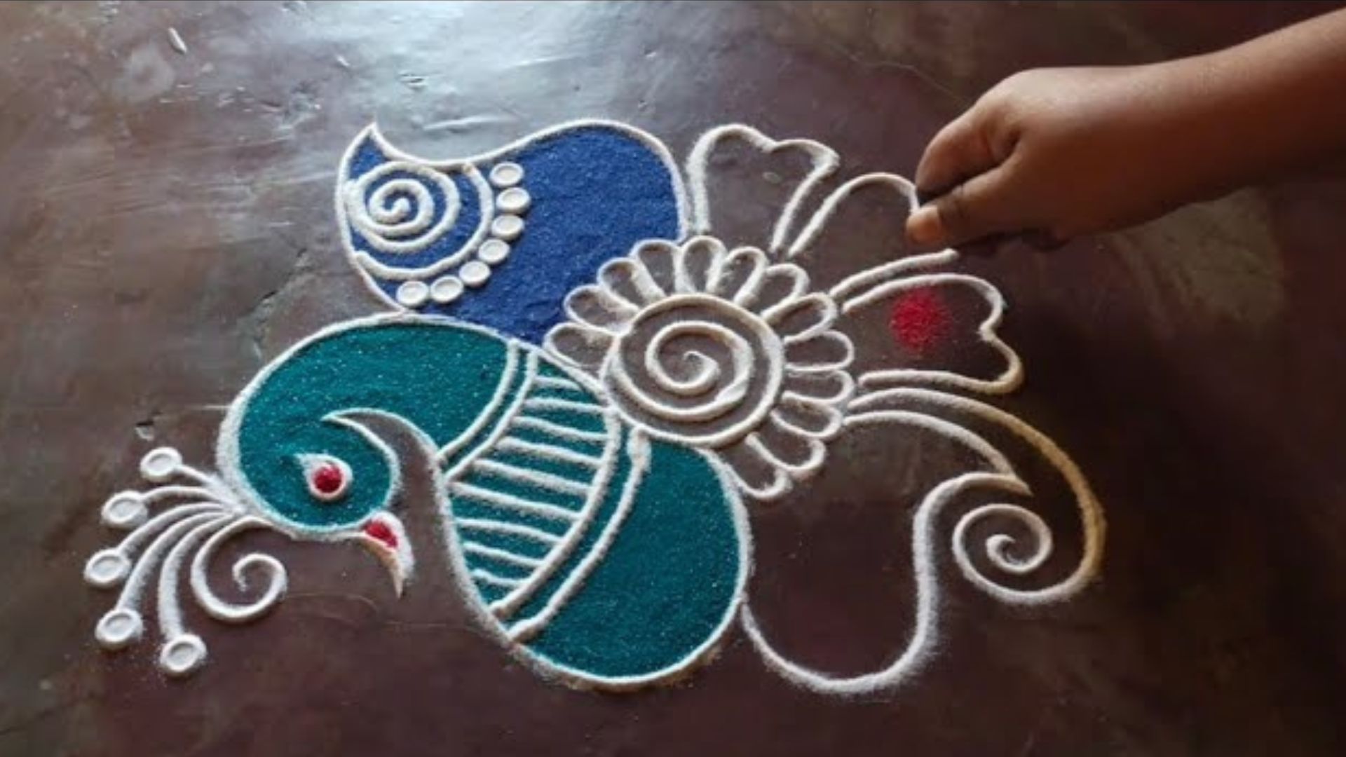 Mor Rangoli Design