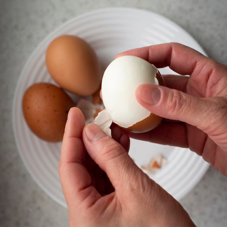 add baking soda while boiling eggs