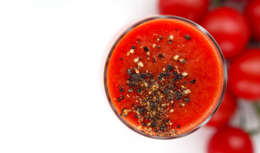glass-cup-with-tomato-juice-with-ground-black-pepper-