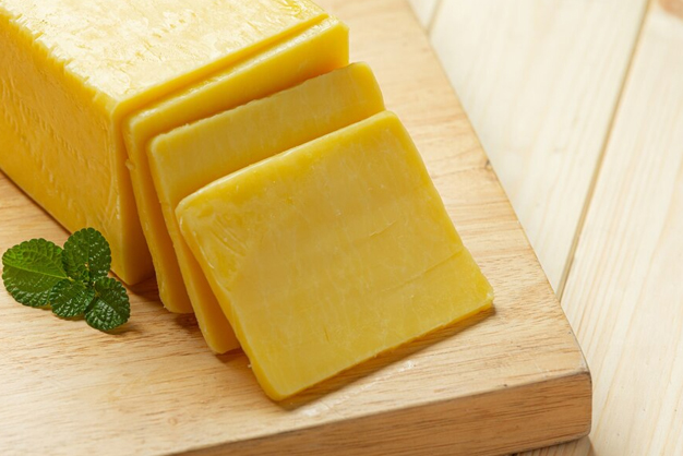 How is a cheese slice made