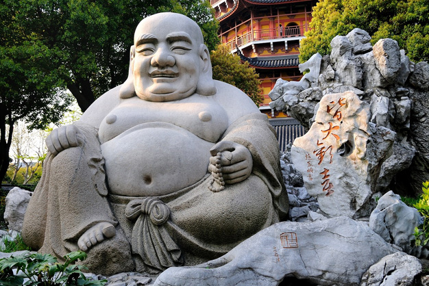 significance of laughing budha
