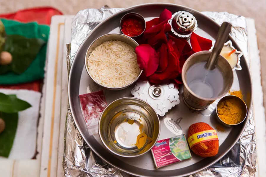 Why is rice used in pooja