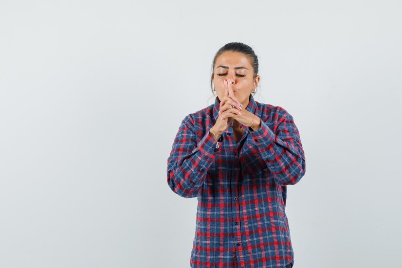 lady-casual-shirt-blowing-finger-pistol-looking-confident-front-view_176474-44844