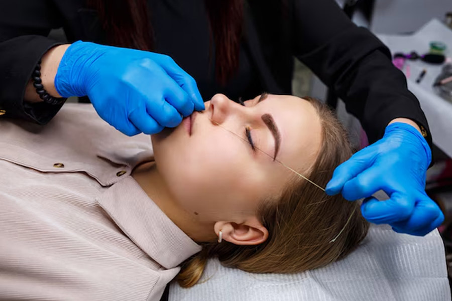 Threading upper lips