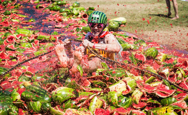 How is Holi celebrated in other countries