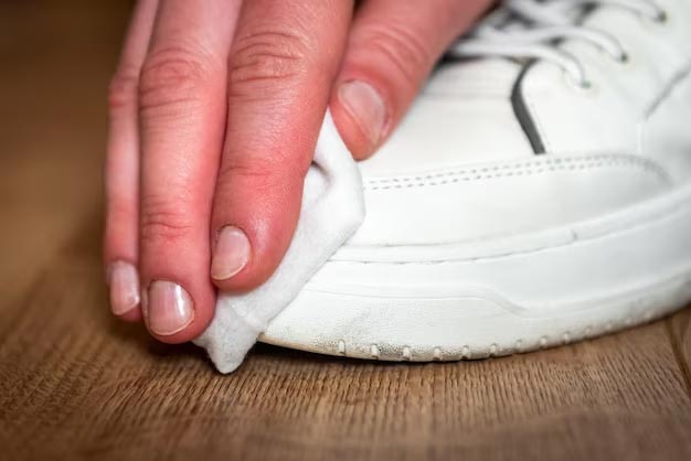 How can I remove stains from white shoes