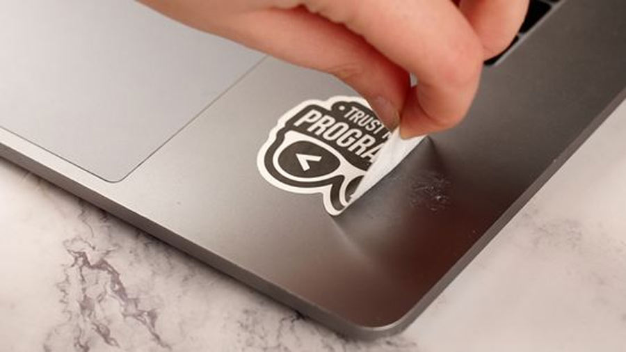 How to clean sticker residue off laptop