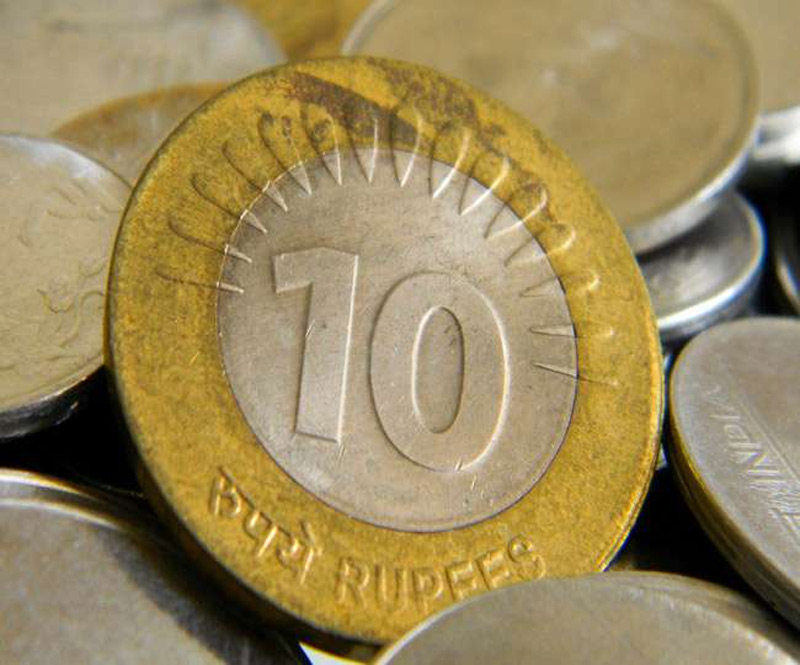 why 10 rupee coin outer is yellow