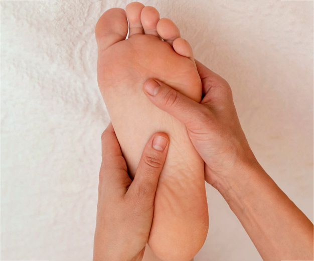 foot massage with garlic for anti  ageing