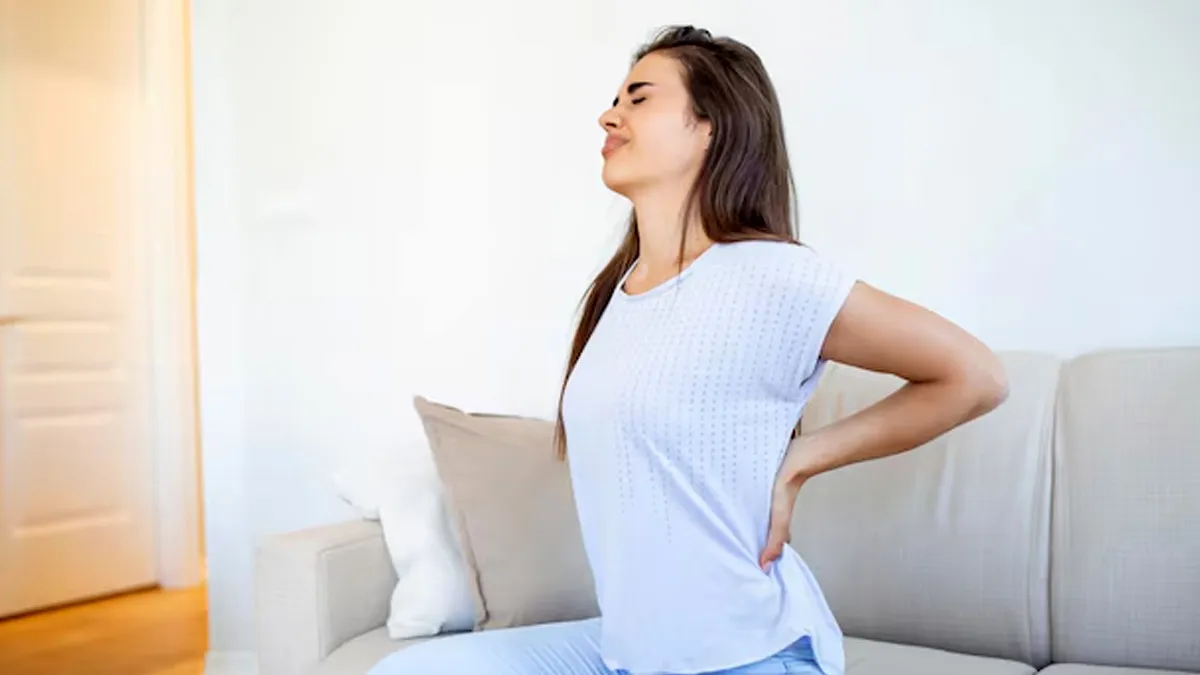 back pain AND WHITE DISCHARGE
