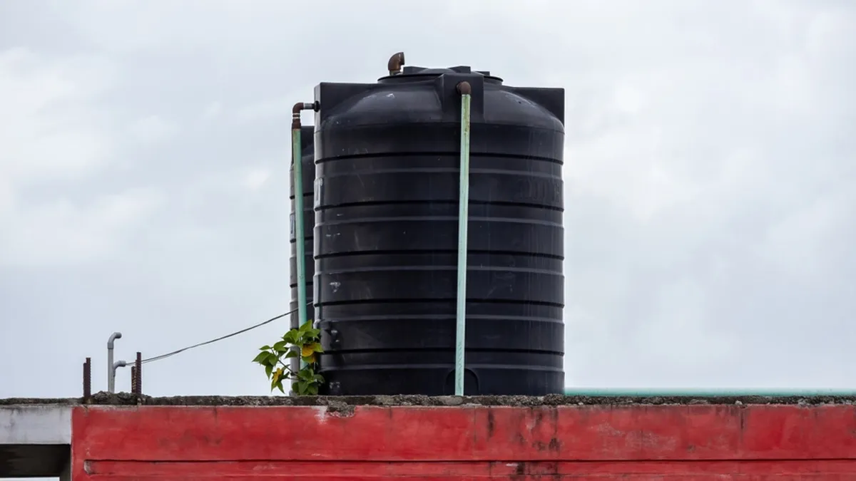 Overhead tank water heating
