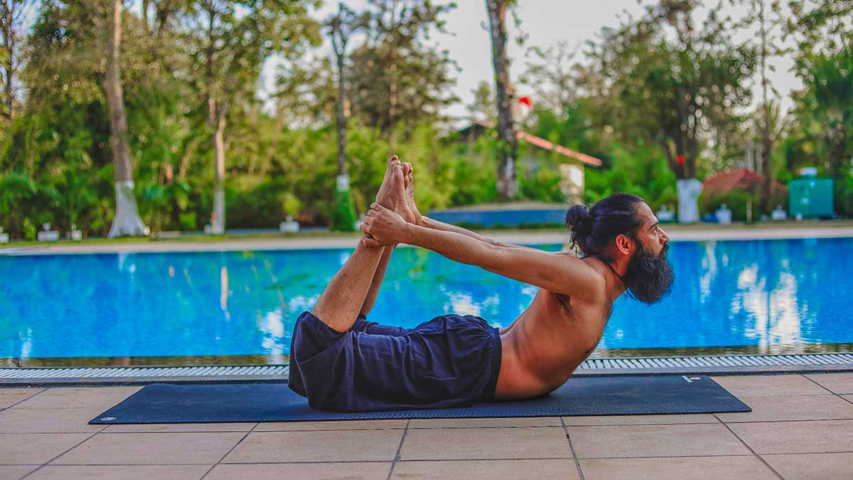 Dhanurasana-Bow Pose for belly fat