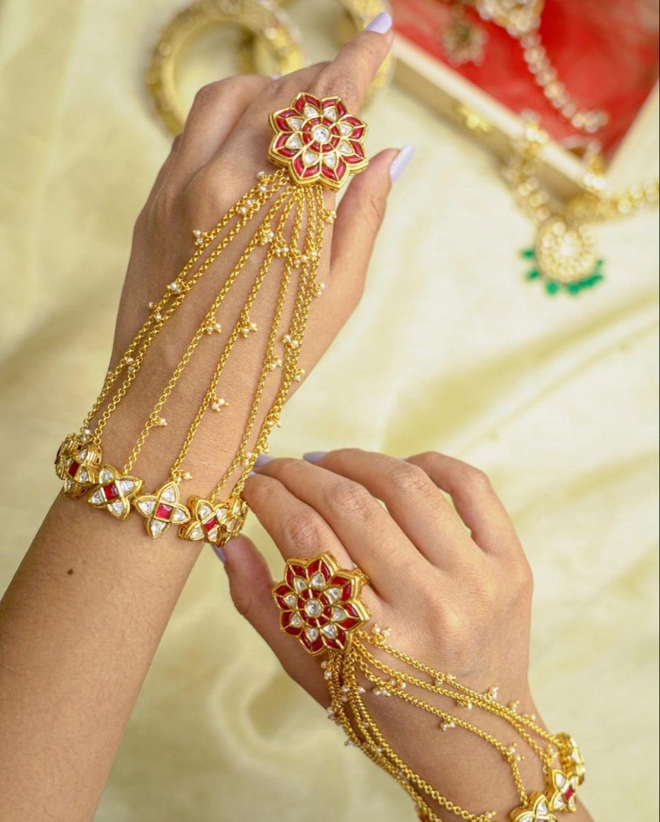 trendy gold plated hathphool designs