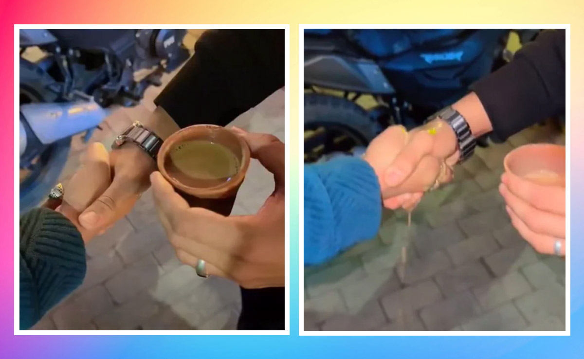 people checking partner loyalty by spilling tea on hands