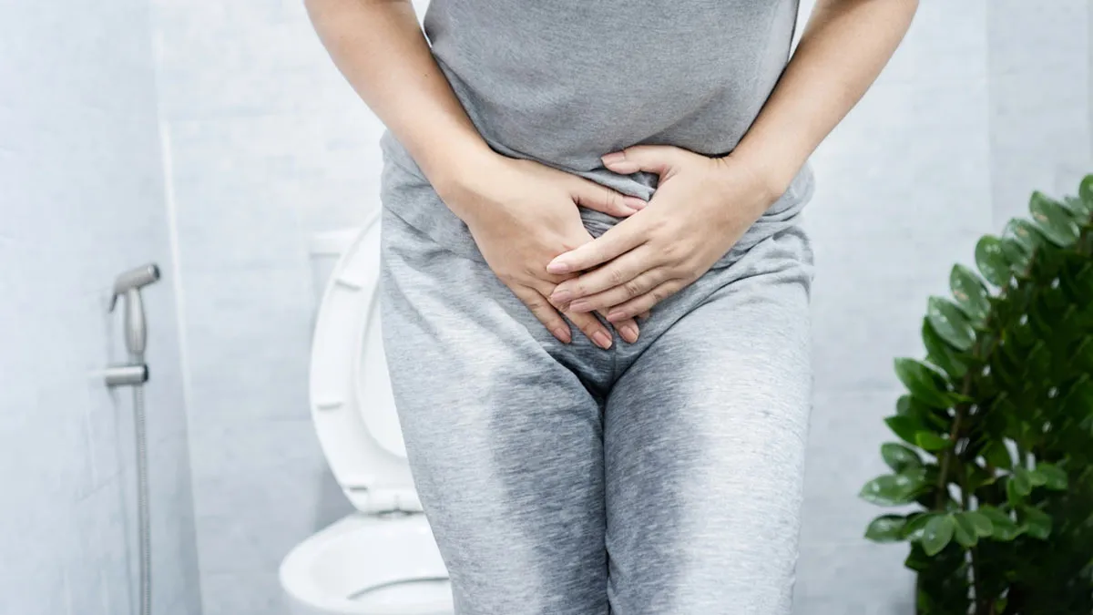 causes of urinary leakage in women after 50