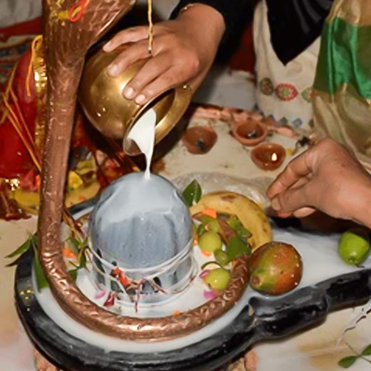 what to do with water after puja
