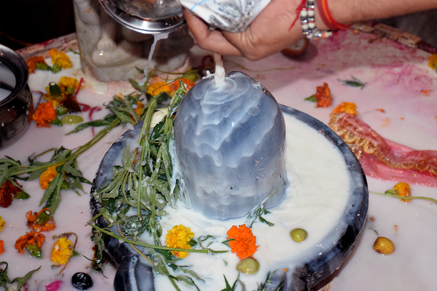 offering milk to lord shiva
