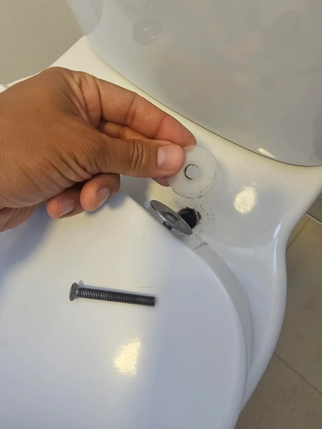 How to fix a falling toilet seat
