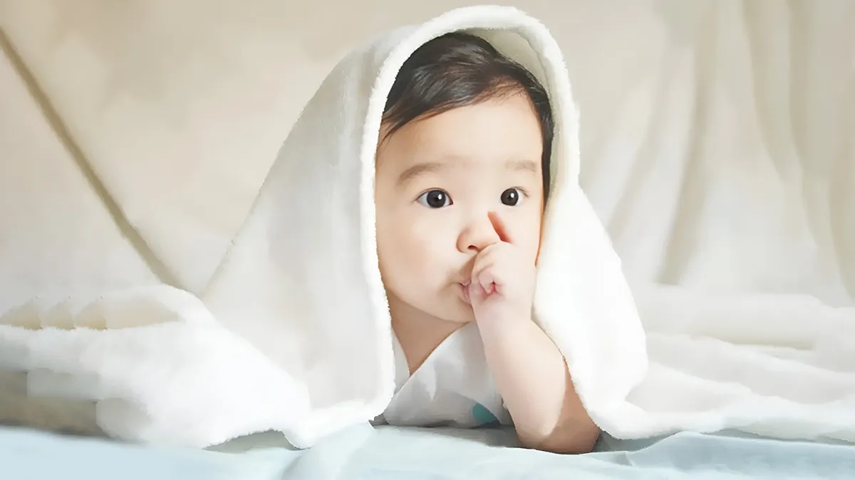 why do babies suck their thumb