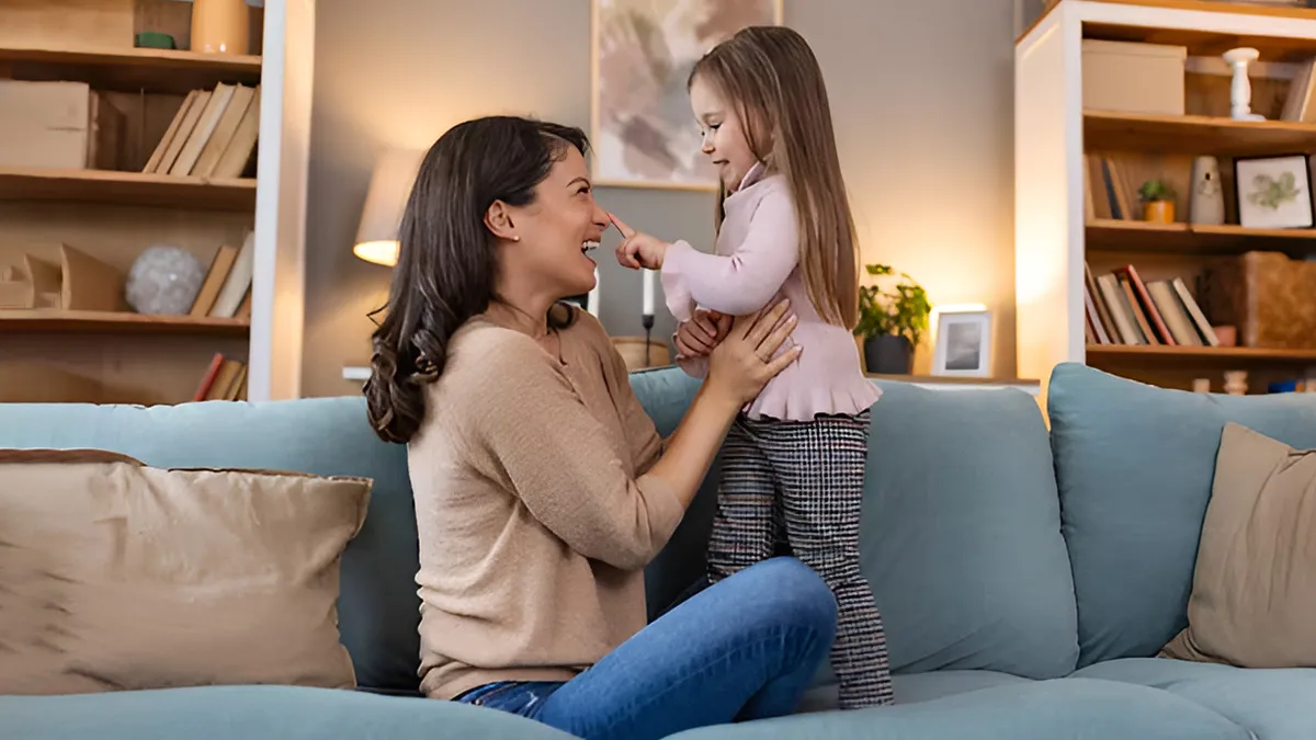 kids touch parents face while talking (magnific)