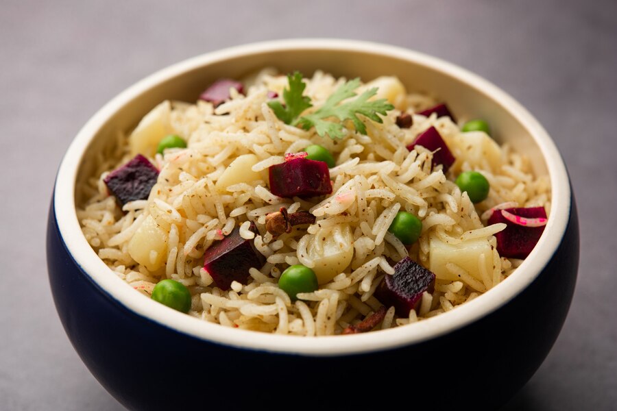beetroot-rice-pulao-pulav-served-bowl-karahi-selective-focus-indian-food_466689-71238