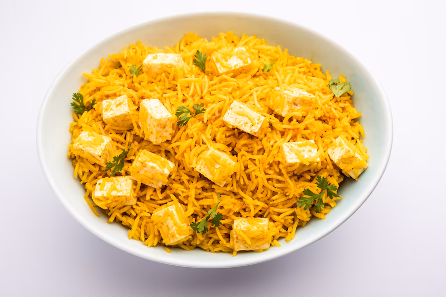 healthy-paneer-pulav-pilaf-using-basmati-rice-served-bowl-plate-indian-food_466689-72567