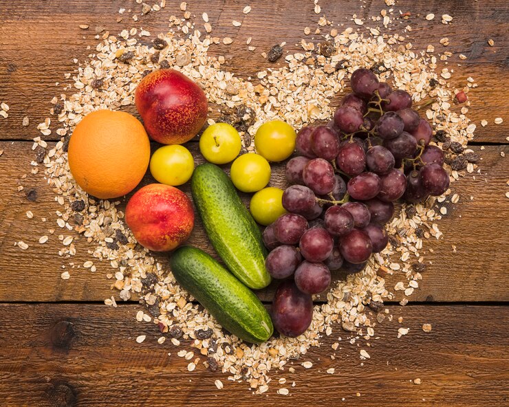 healthy-fruits-heart-shape-made-with-oats-nut-food-wooden-desk_23-2147882195