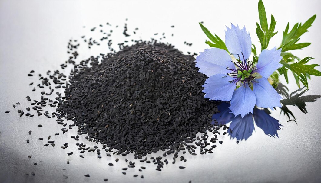 black-cumin-seeds-with-nigella-sativa-flower-white-background_820340-17326 (1)