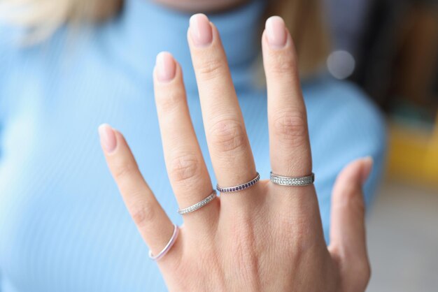 woman-hand-with-beautiful-thin-silver-rings_151013-37004
