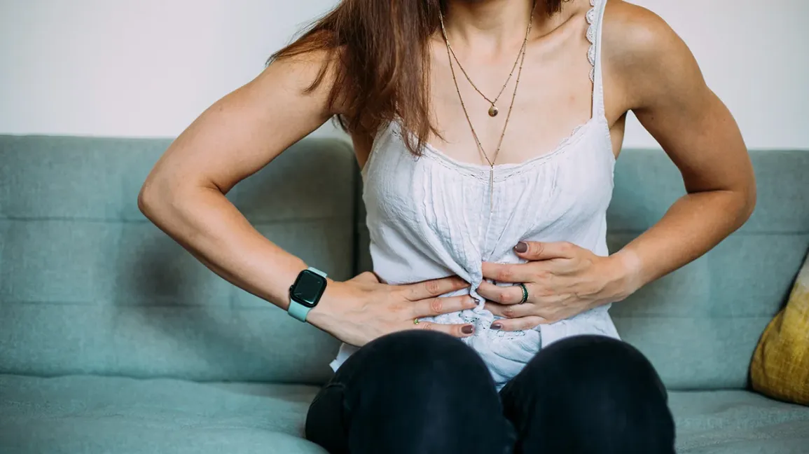 female-holding-stomach-1296-728-header