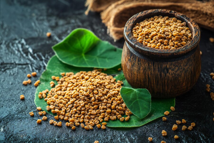 organic-fenugreek-seeds-wooden-bowl-green-leafy-background-natural-herbal-culinary_1293074-228828