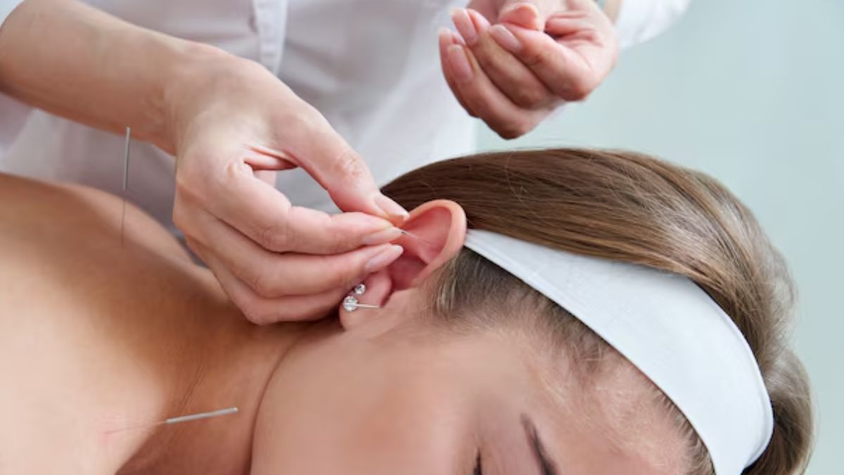 Ear acupressure massage