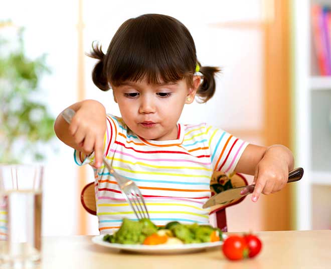 child eating food