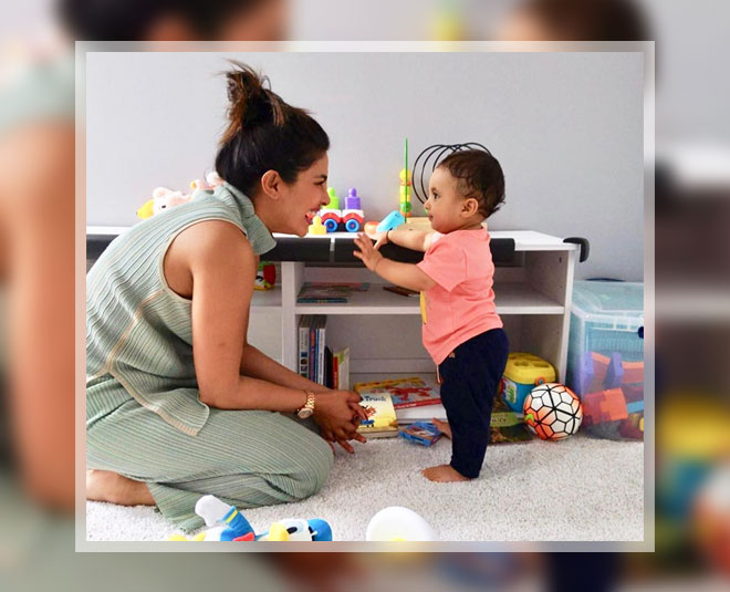 priyanka chopra playing with kid in family inside 