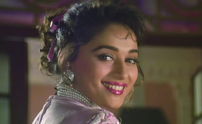 What is the name of Madhuri's debut film? madhuri debut film quiz
