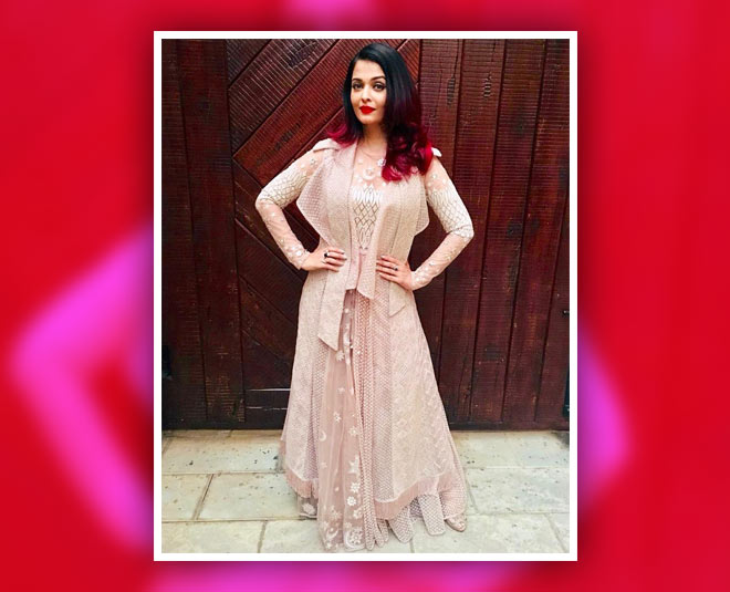 पीच कलर का आउटफिट- aishwarya rai daughter