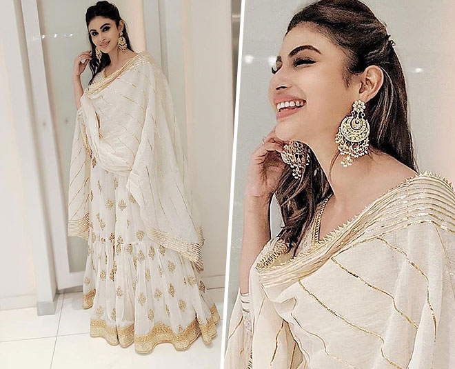 Mouni Roy 🌸 For @brahmastrafilm 🤎 ______ White rose Lehenga 🌺 Hand  painted bunches of white roses on a mauve organza Lehen... | Instagram