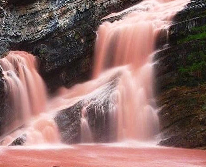 pink water fall that changes its colour frequently Main