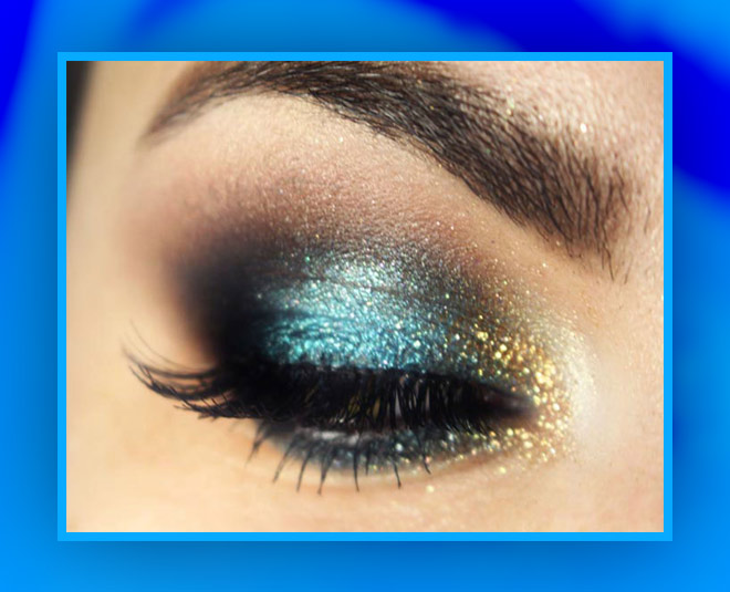 blue eye and golden makeup
