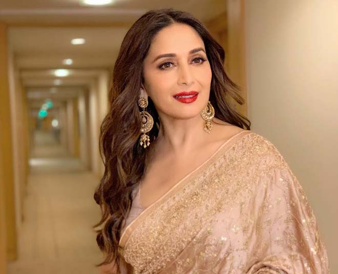 Take Inspiration From Madhuri Dixit Stunning Looks In Gold Colour Outfit In Hindi Take 