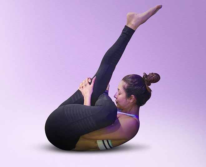 malaika arora fitness pigeon pose inside