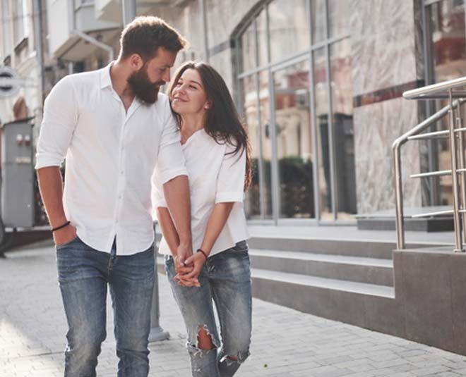 young funny loving couple inside 