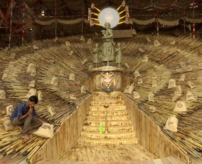 kolkata durga pandal showcases women migrant worker inside 